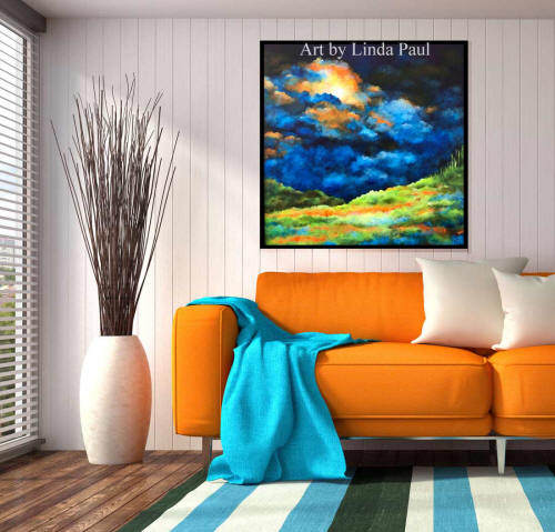 blue and orange living room with art