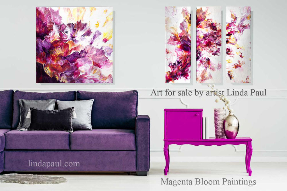 Magenta abstract art paintings in living room with purple sofa
