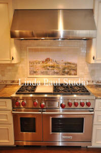 tuscan backsplash iwth crema marfil tile and wold range