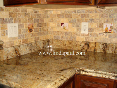 kitchen backsplash ideas on a budget - tile accents by artist Linda Paul 