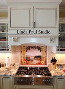sunflower backsplah idea with bisque kitchen cabinets