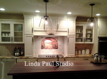 everything Tuscnay backsplash in neutral kitchen