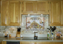 Italian kitchen mural with dark travertine subway tile