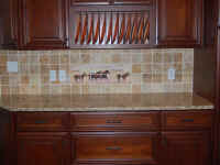 running horses mural back splash installation.jpg