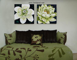 linda apul's Lotus and Clematis flower painting over brwon and green sofa bed