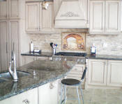 everything tuscany mural with italian chef in stacked stone backsplash