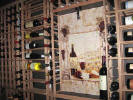 wine country backsplash installed in wine cellar
