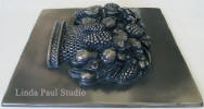 side view of fruit basket metal tile