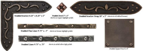 collection of metal studded liners brackets and accents