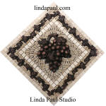 garpe and vine small medallion