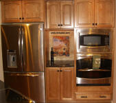 Tuscnay Window custom splash back in maple kitchen