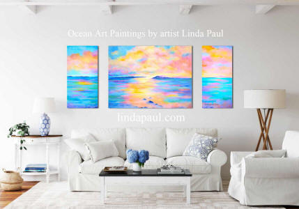 beach house coastal living room idea with ocean art