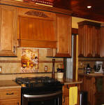installation picture of tuscan tiles with copper accents