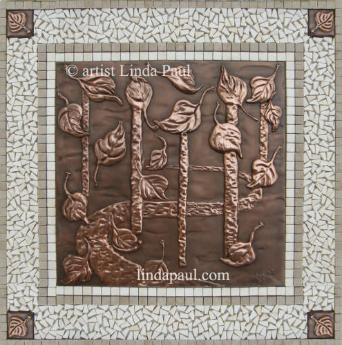 falling leaves Kitchen backsplash tile and metal medallion