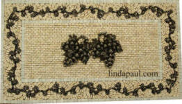 wandering vine and vienna grapes custom backsplash medallion