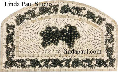 arched grape and grapevine backplash medallion